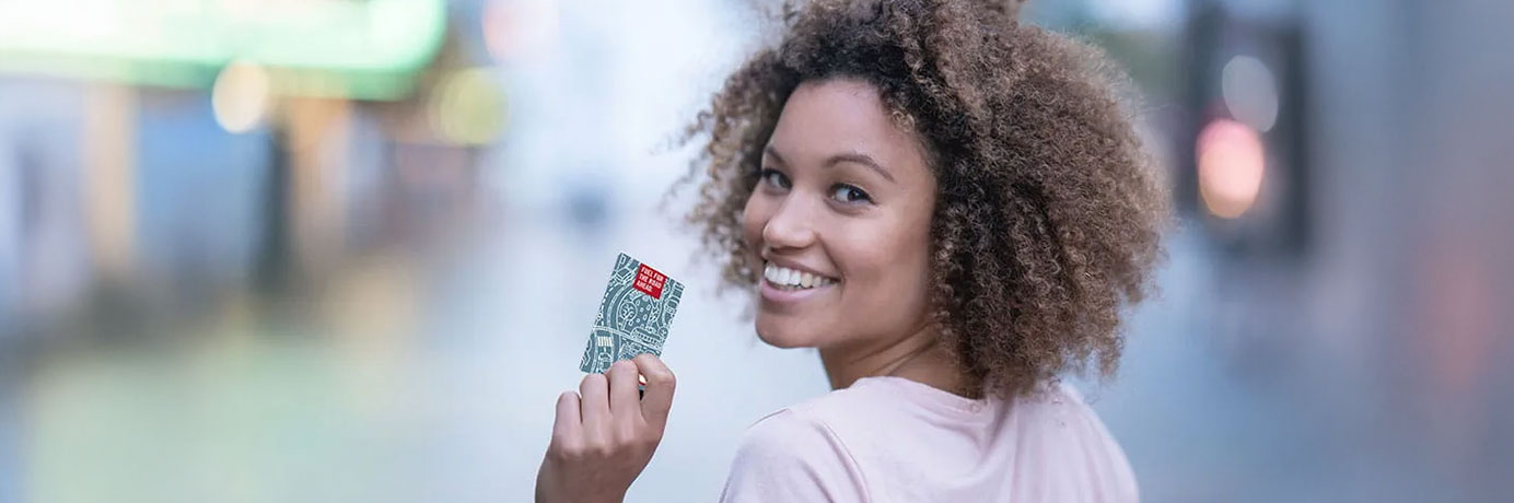 Woman holding a gift card