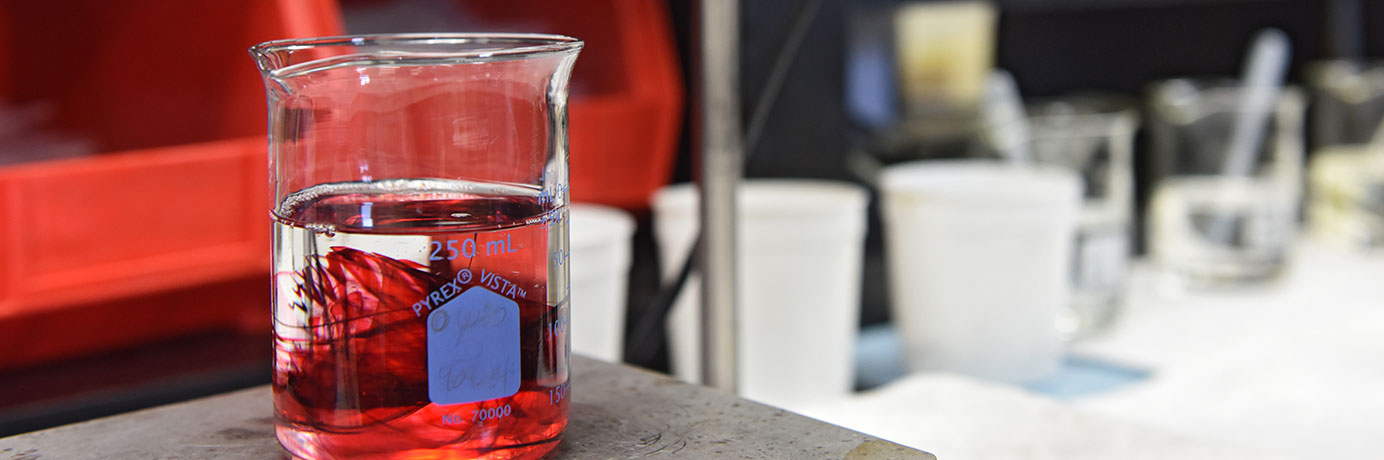 Beaker with red liquid