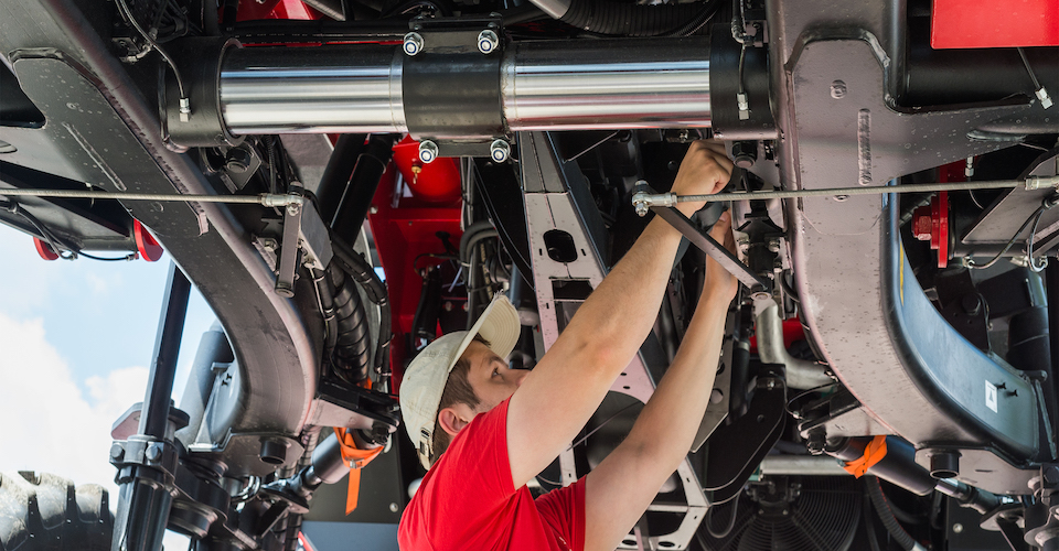 Checking the gears of a tractor