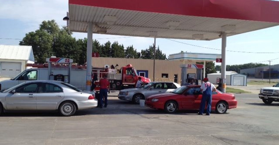Filling up with gas at a Cenex gas station