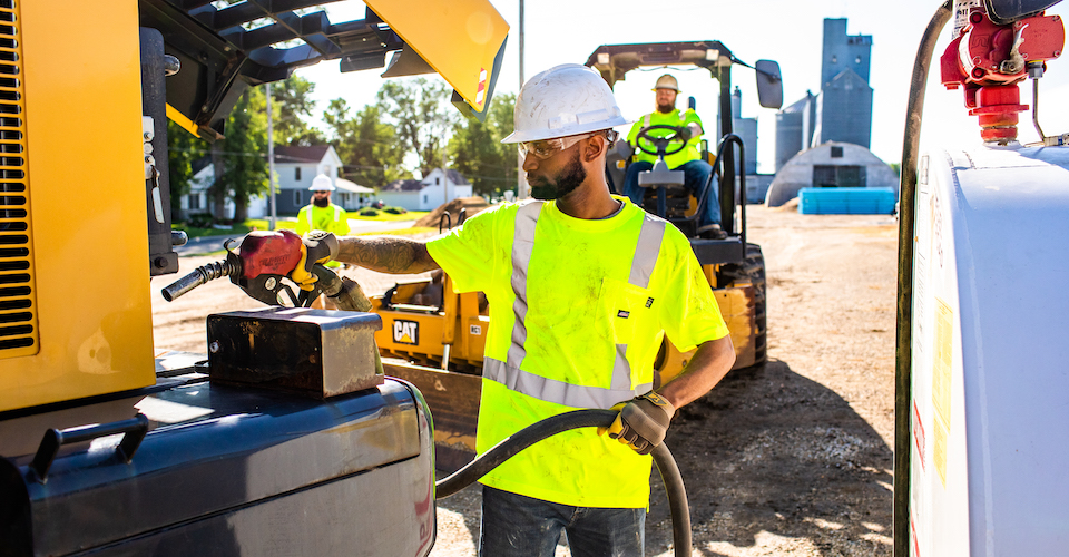 Filling up construction equipment with gas