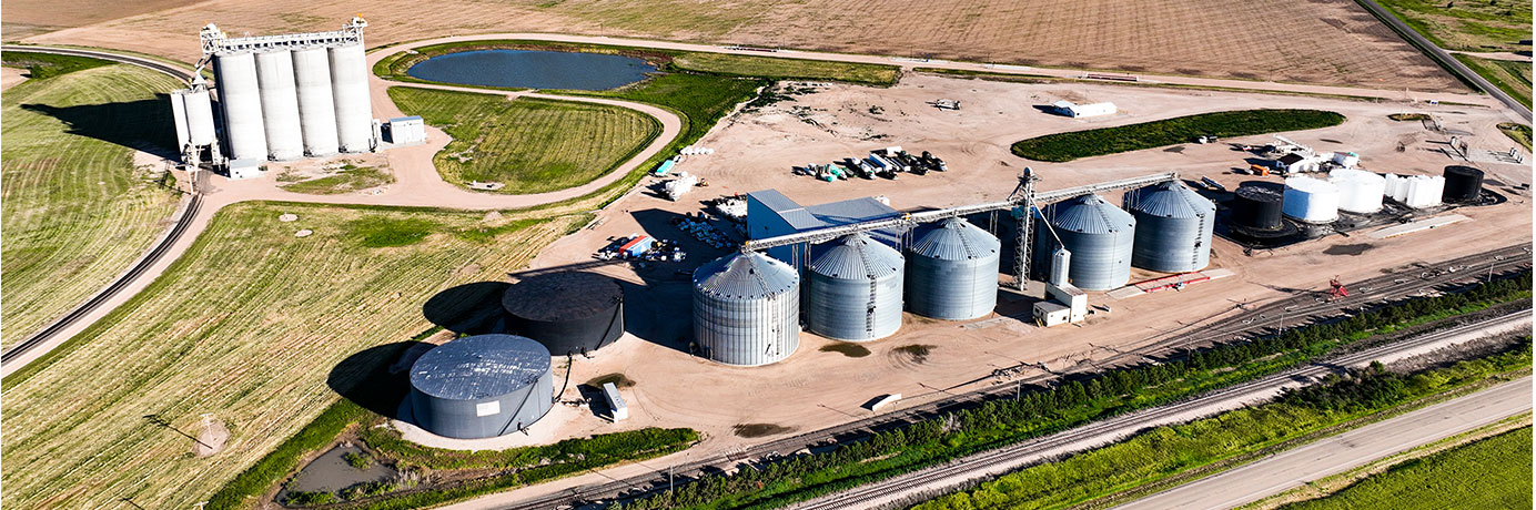 Aerial view of grain bins and grain elevators