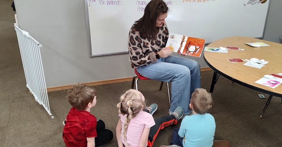Teacher and kids at Kids Academy