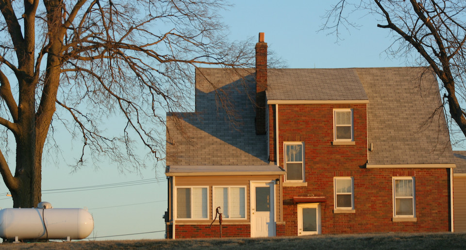 Home with propane tank to power heating
