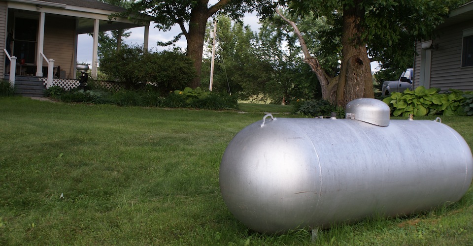 Propane tank in a backyard