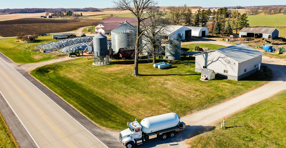 Propane truck leaving a farm after filling their home propane tank