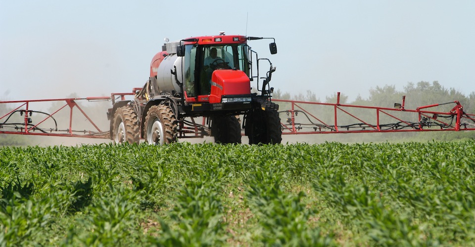 Spraying crop nutrients on a field