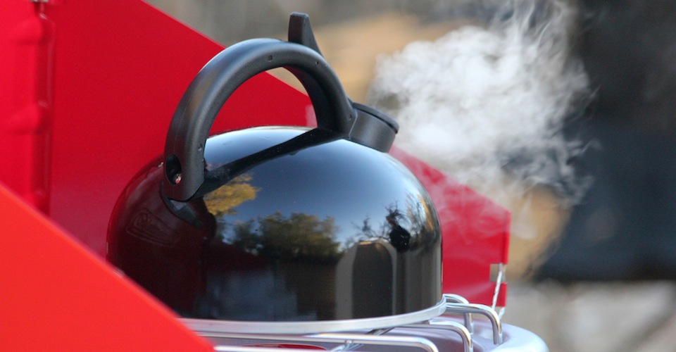 Using propane, heating a tea kettle