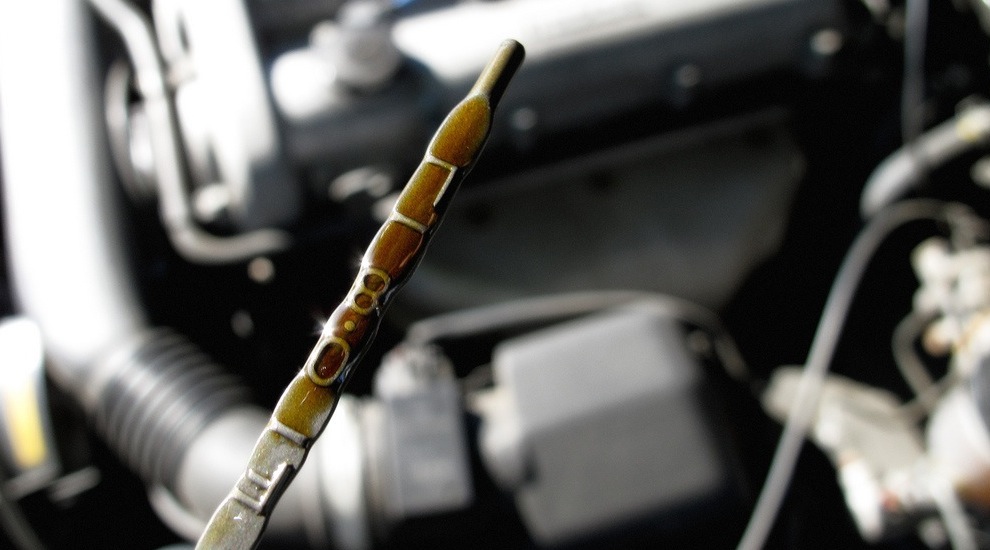 Checking an oil dipstick 