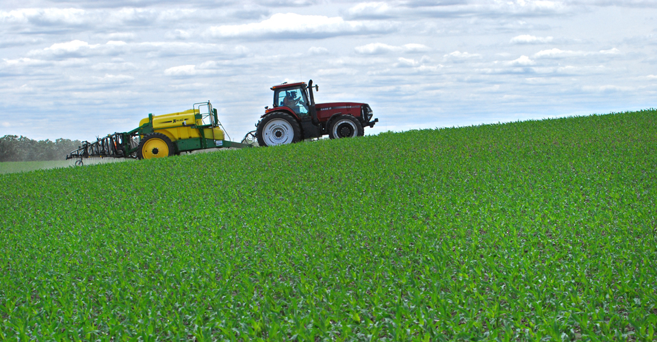 Tractor driving along a field