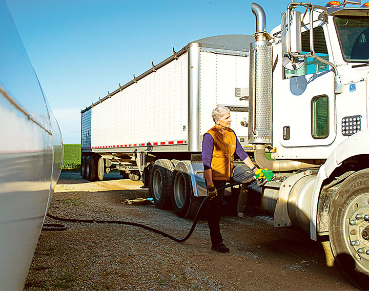 Theresa fueling a semi truck
