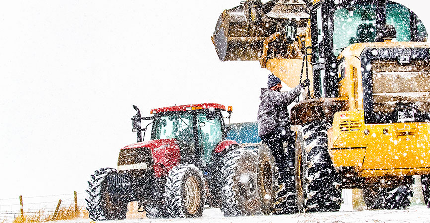 Farm vehicles in the snow